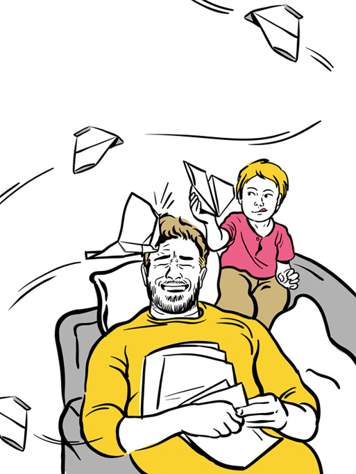 Frederik Jurk / little child playing hits daddy in the head with the paper airplane 