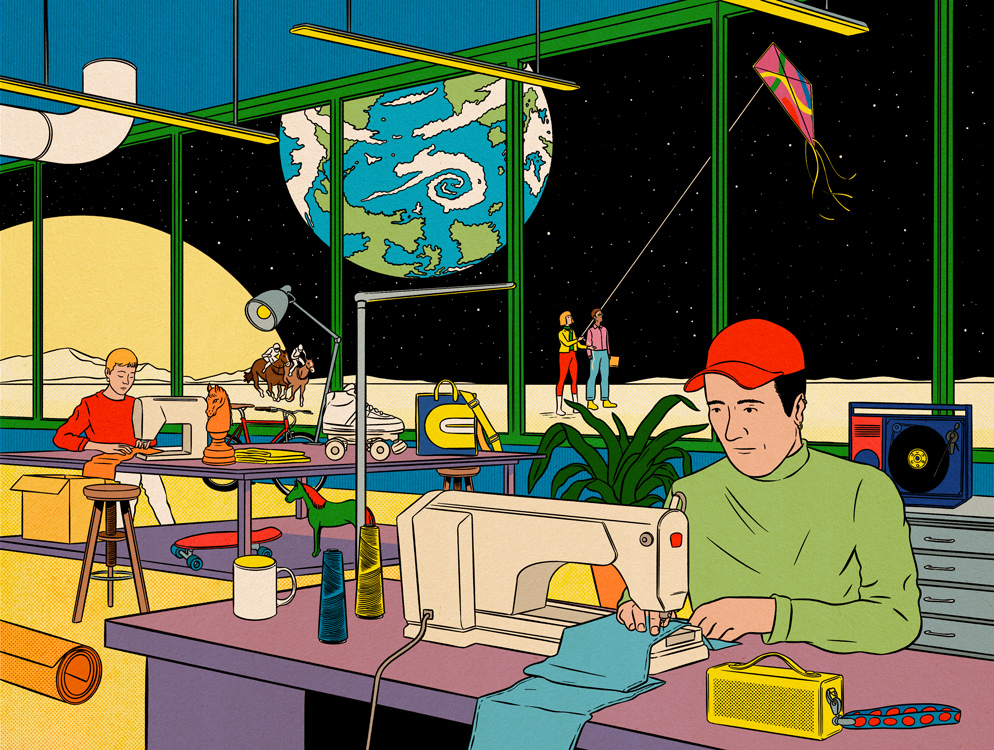 man sitting at a sewing machine with the space and globe in the background
