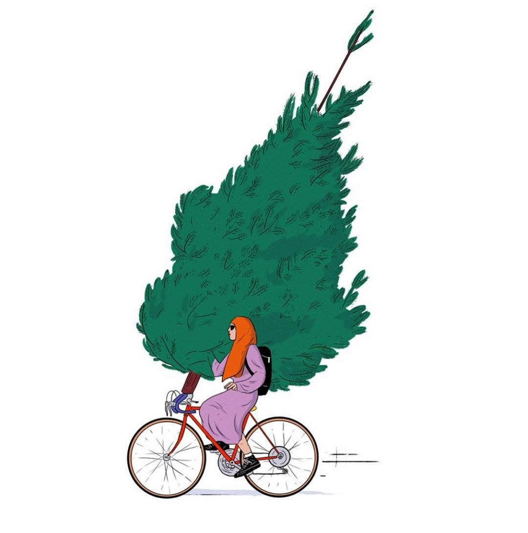 woman trasporting a christmas tree with her bike