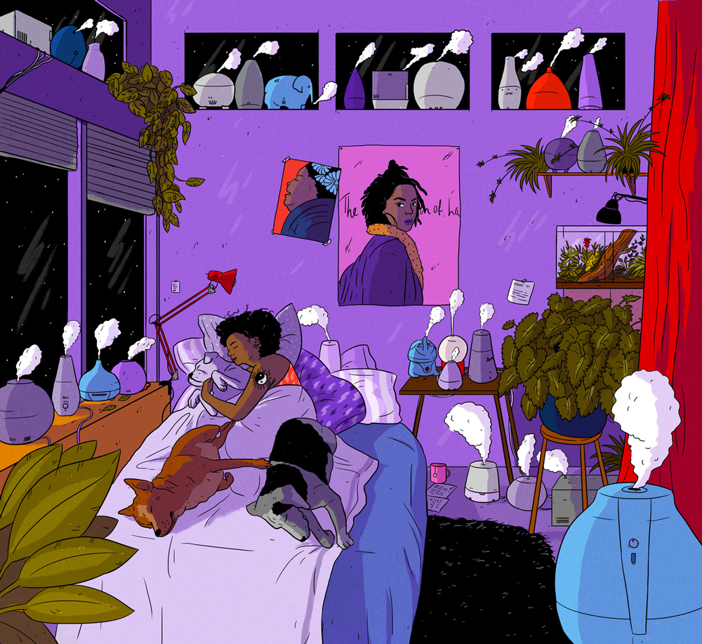 woman cuddling with dogs in bed with many humidifiers in room at night