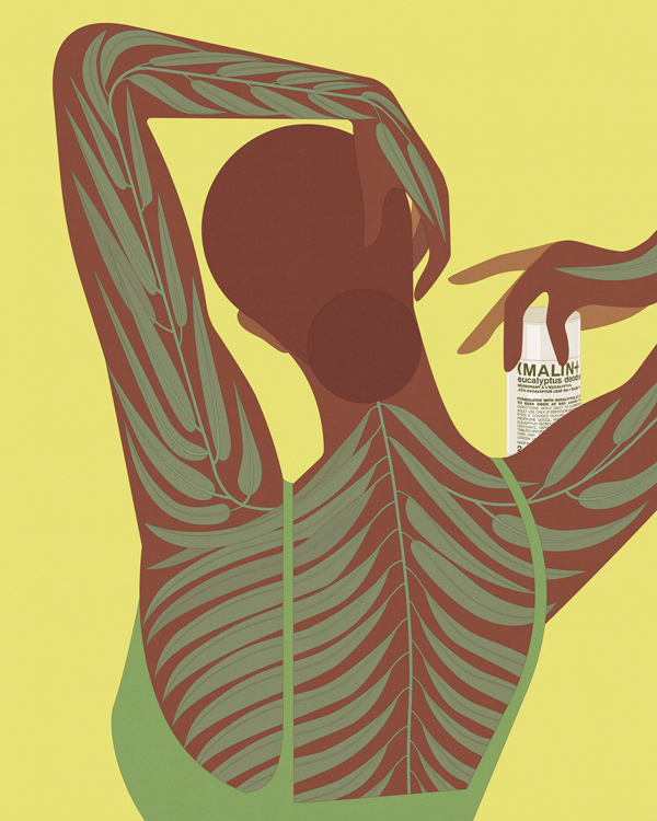 elegant women's back with eucalyptus leaves