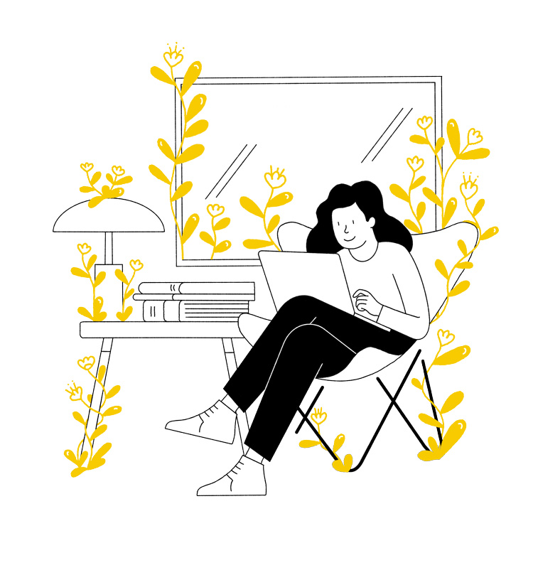 woman sitting in a room full of flowers