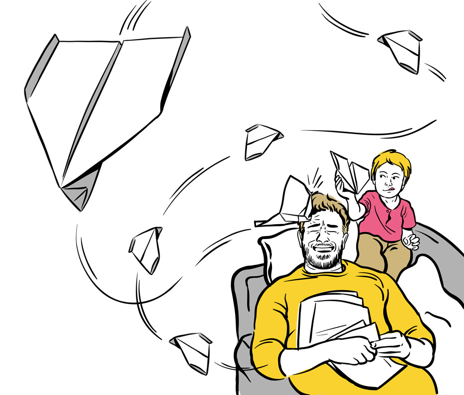 boy and dad with paper airplane 