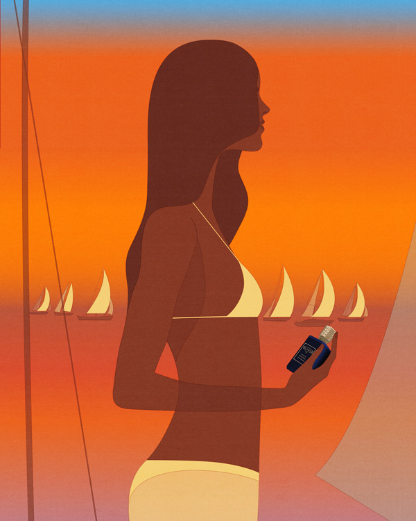 woman holding fragrance at the sea 