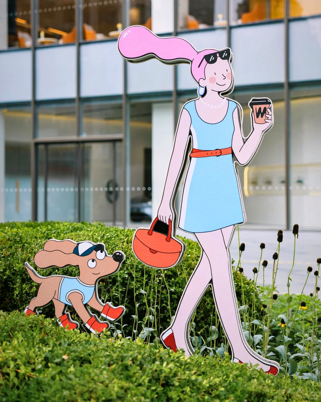 woman walks with dog 
