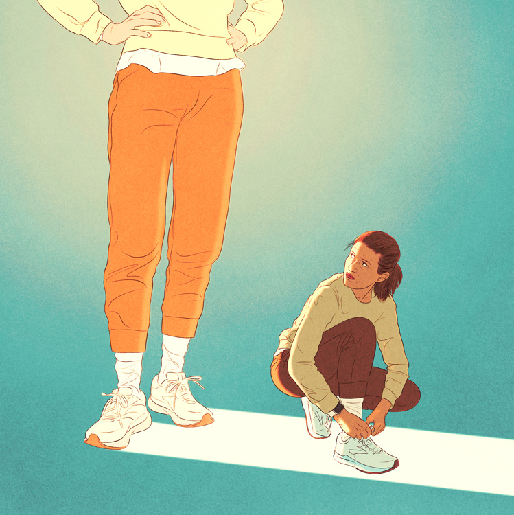 woman kneeling next to a very tall woman 