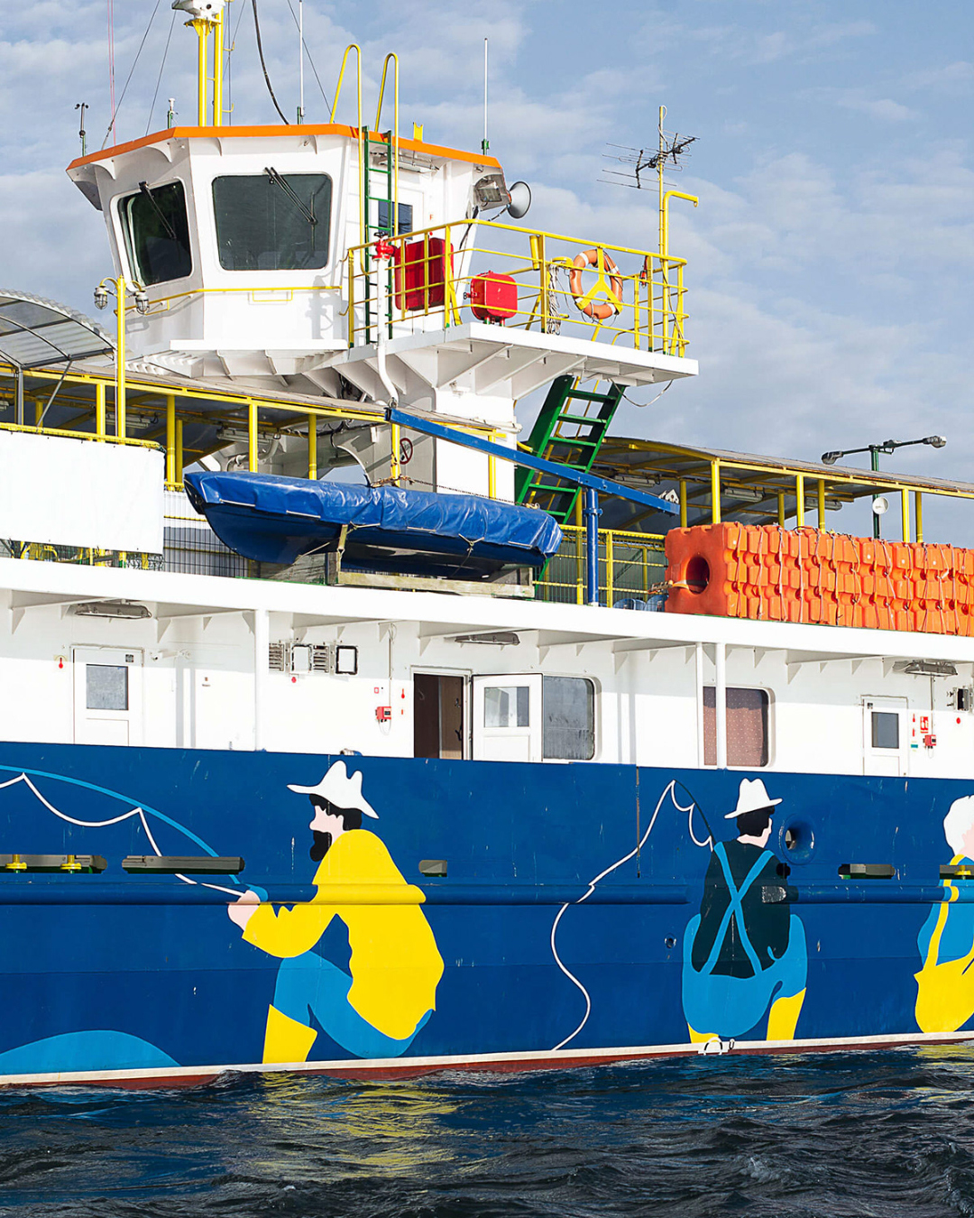 detail of painted men on a ferry