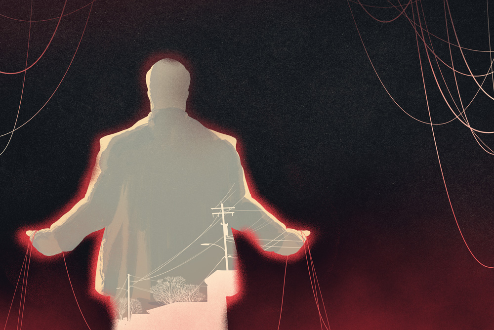 man from behind with puppet strings
