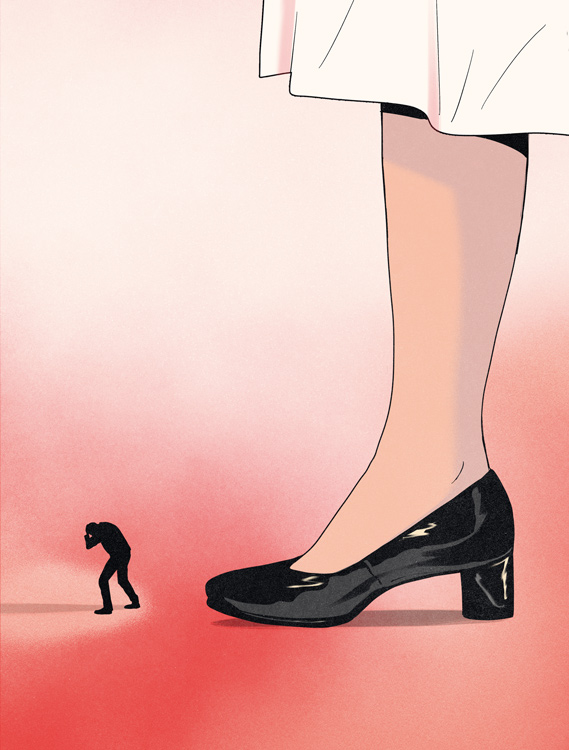 huge womans foot in high heels standing beside small shadow of man in stooped posture