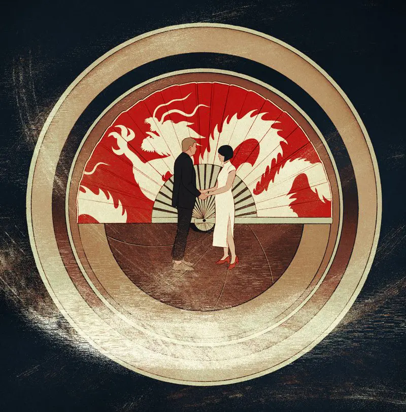 couple in front of a dragon fan 